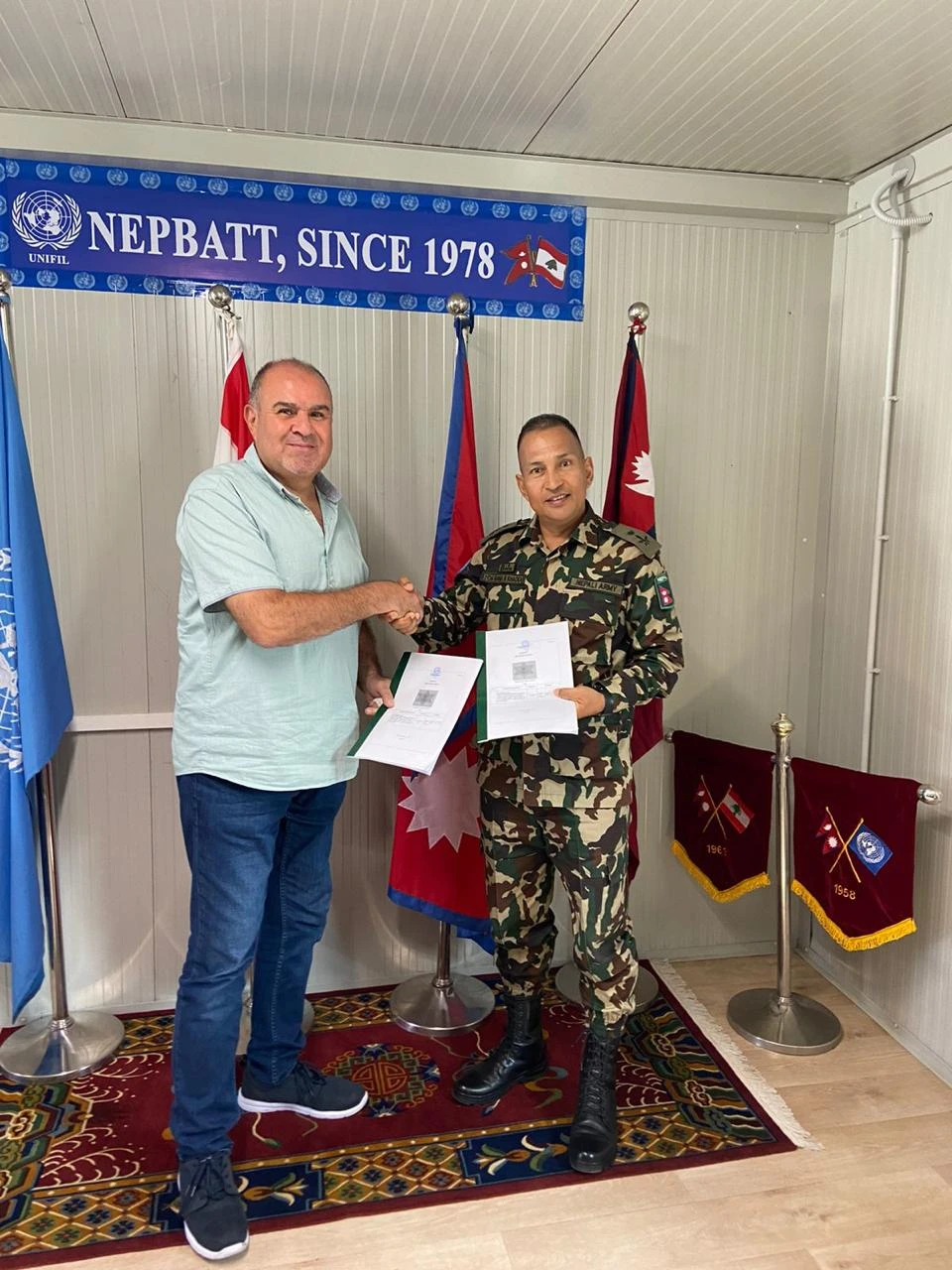 Mohamad Kouwatli of S.O.S KIMIAL with the commanding officer of UNIFIL NEPBATT in South Lebanon